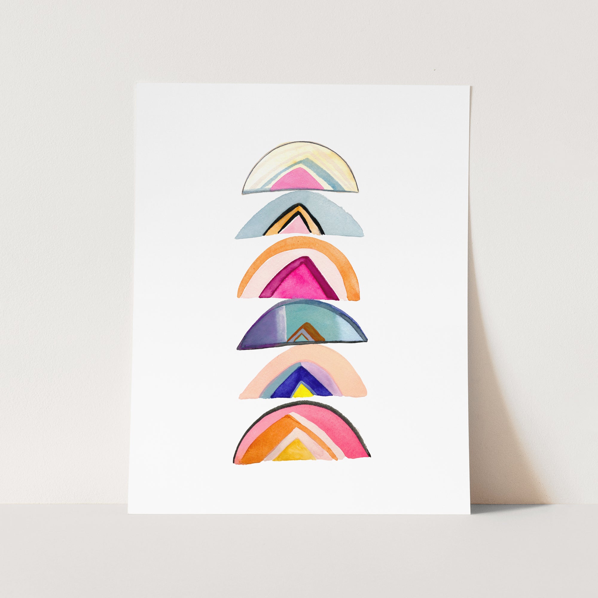 a white card with a multicolored design on it