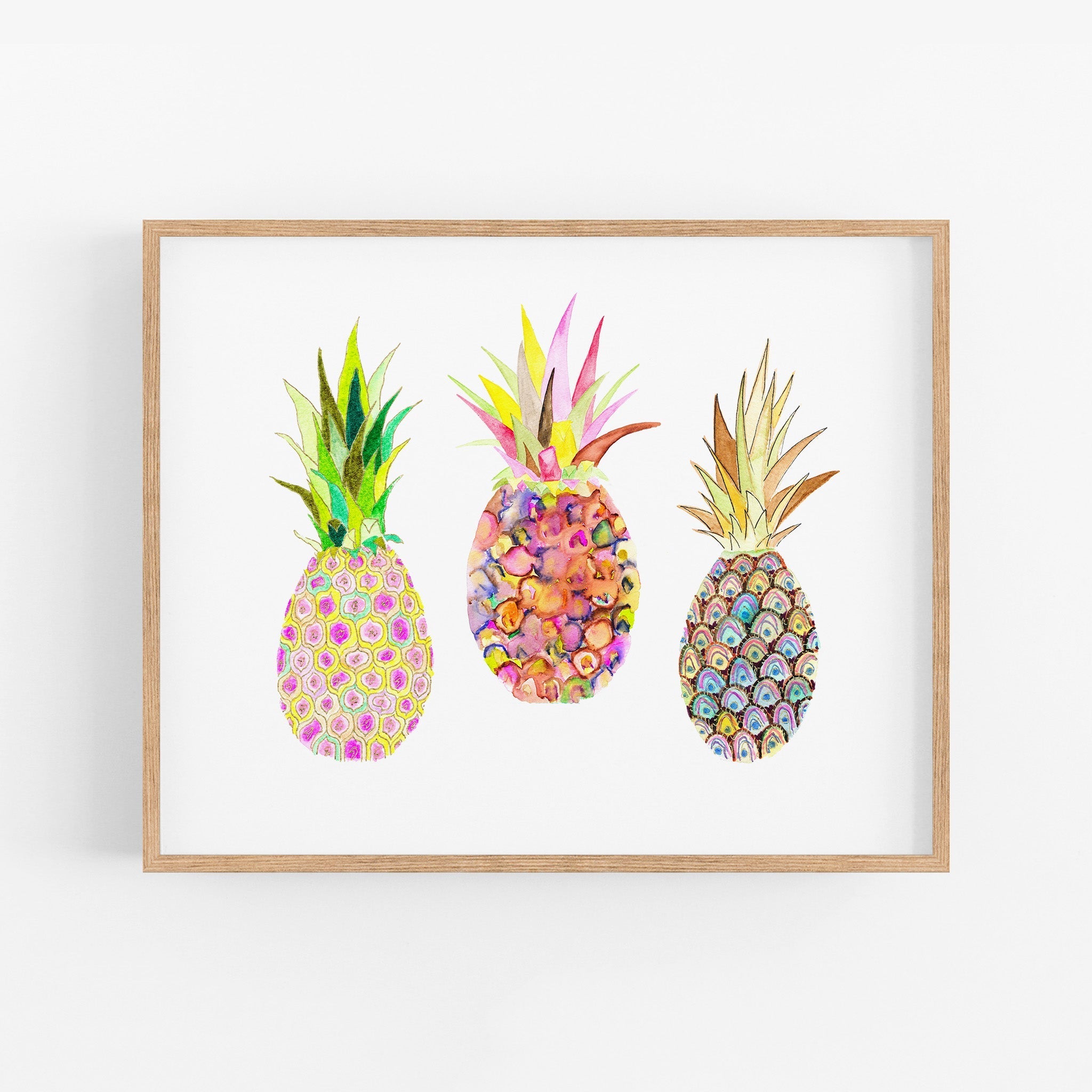 a picture of three pineapples on a white background