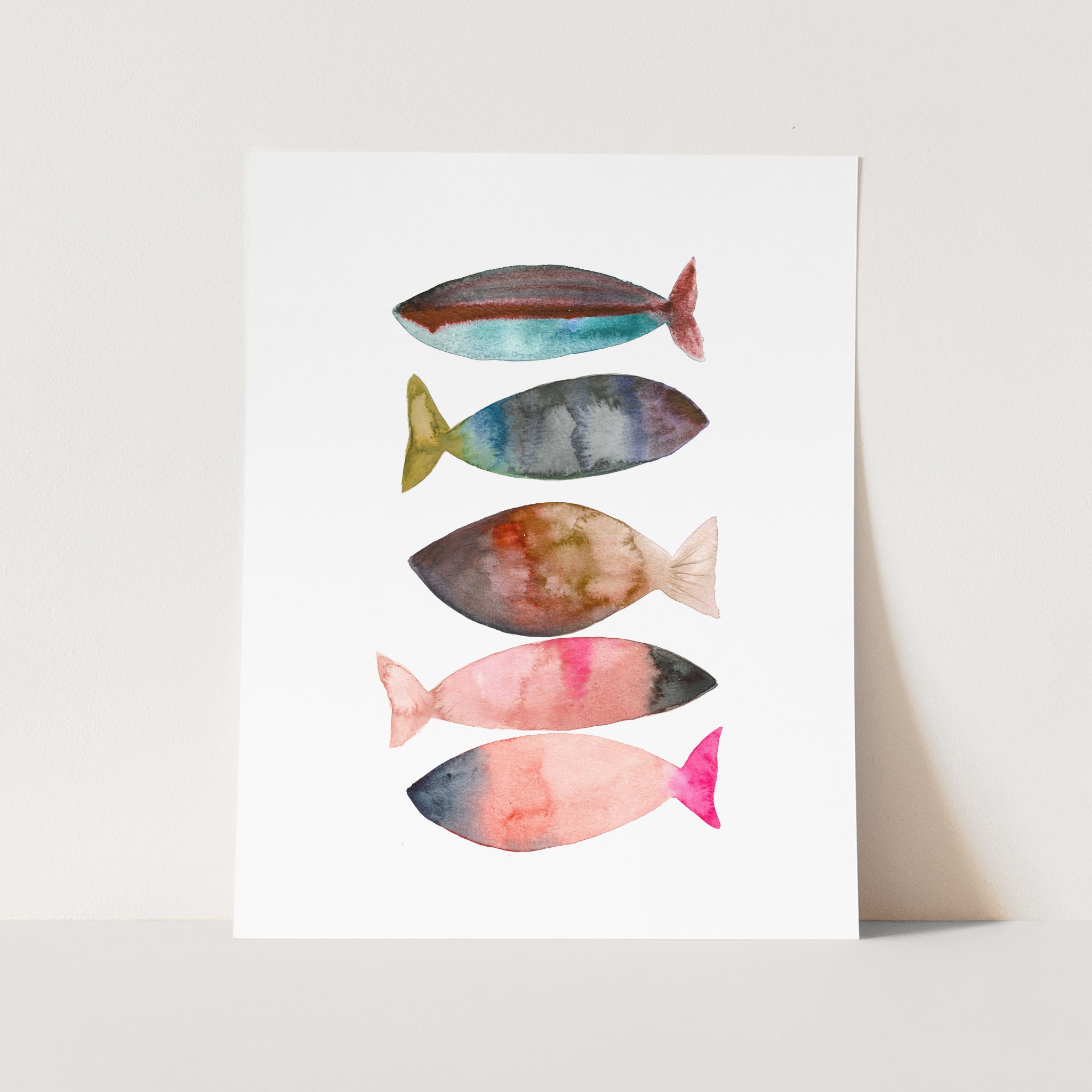 a watercolor painting of fish on a white background