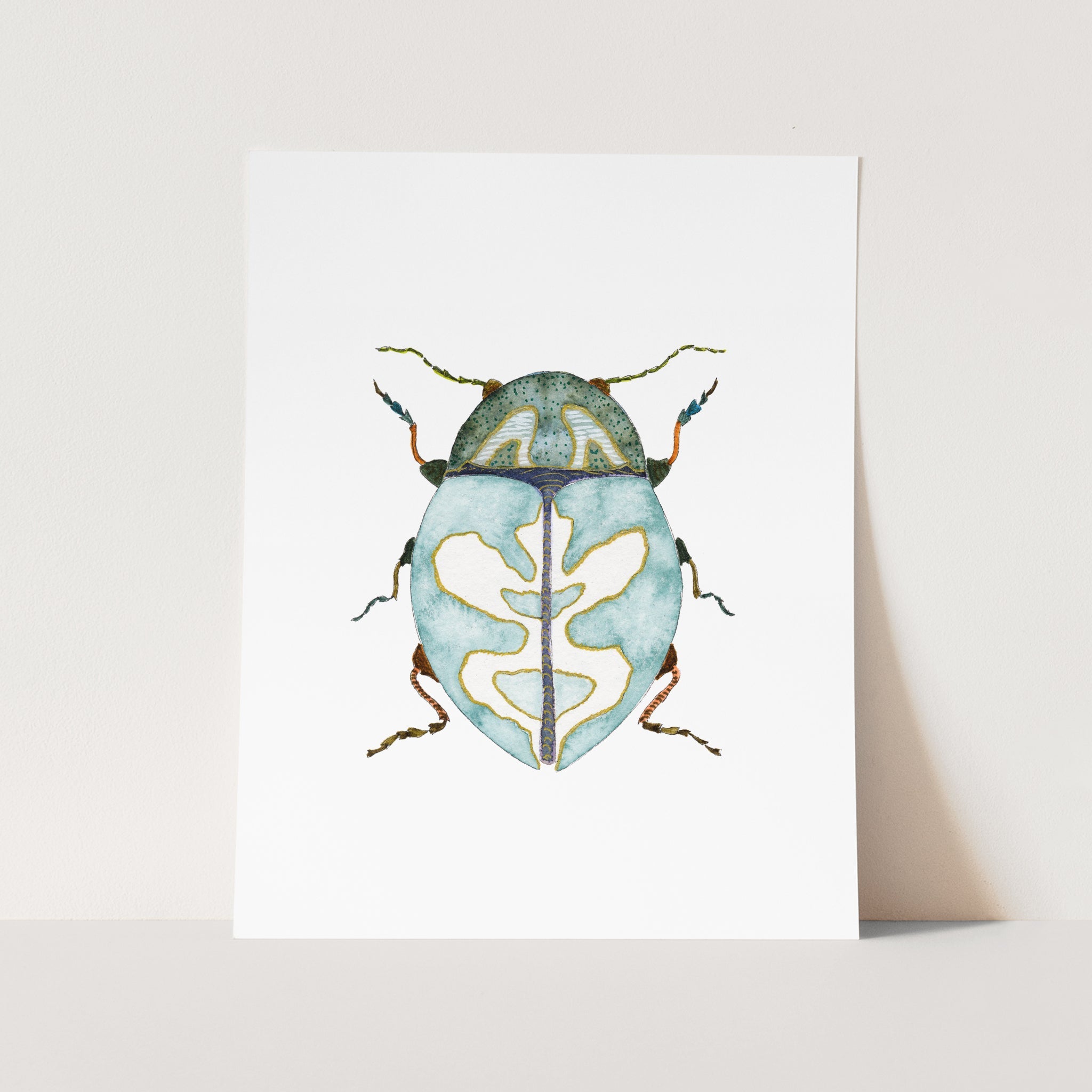 a card with a watercolor drawing of a bug