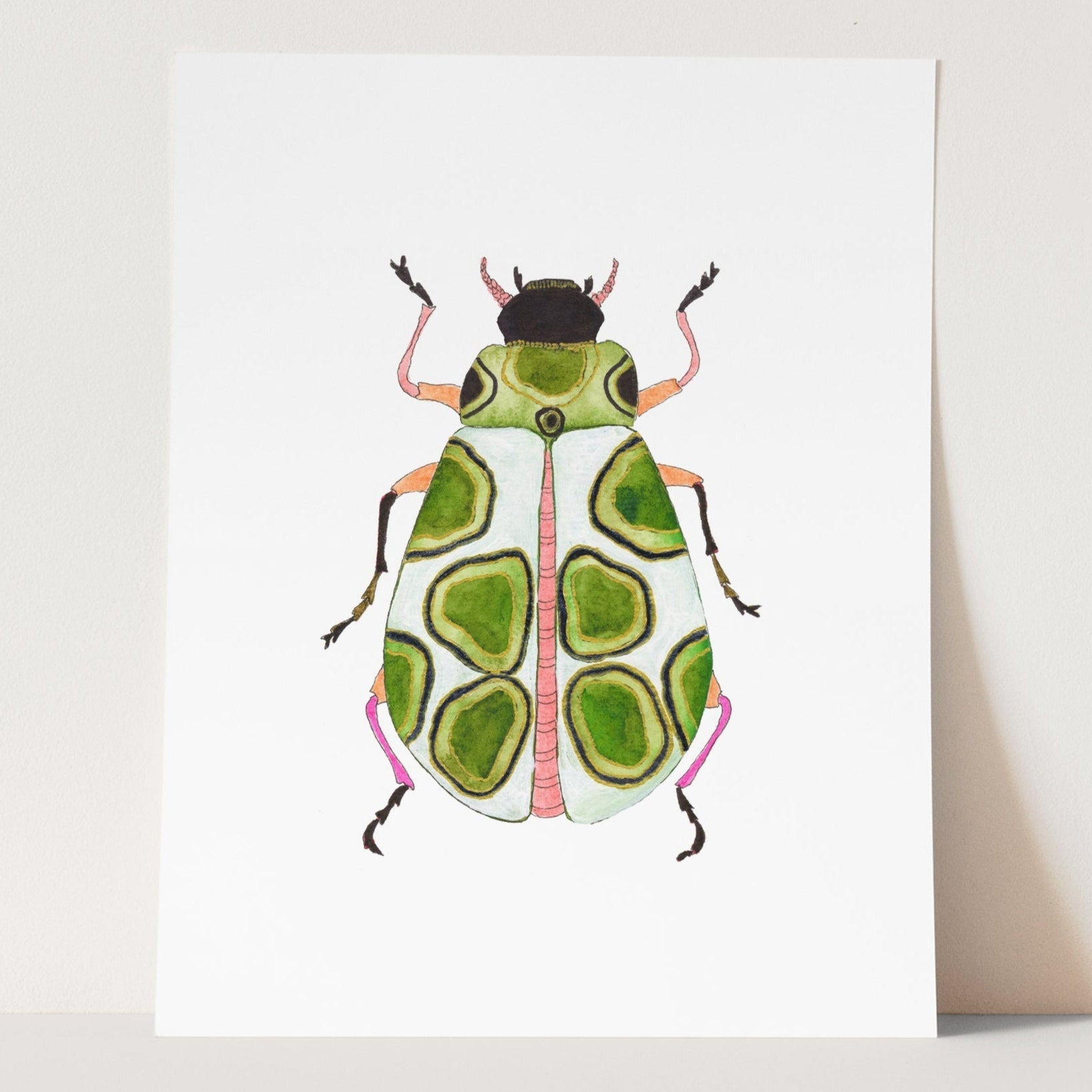 a card with a picture of a beetle on it