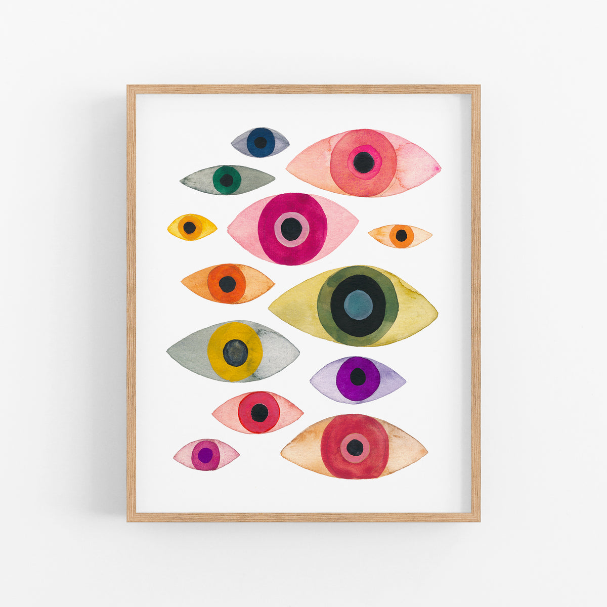 a painting of colorful fish on a white wall