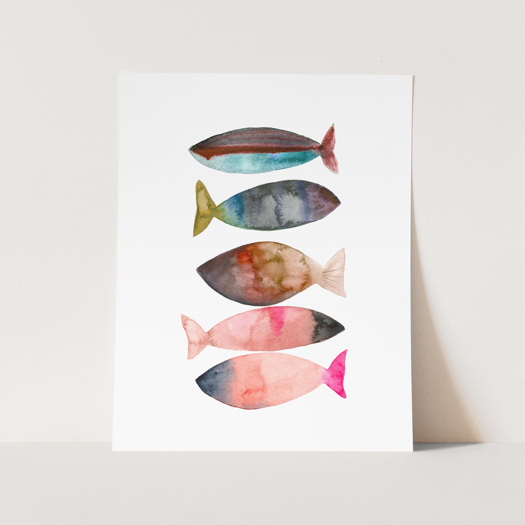a watercolor painting of fish on a white background