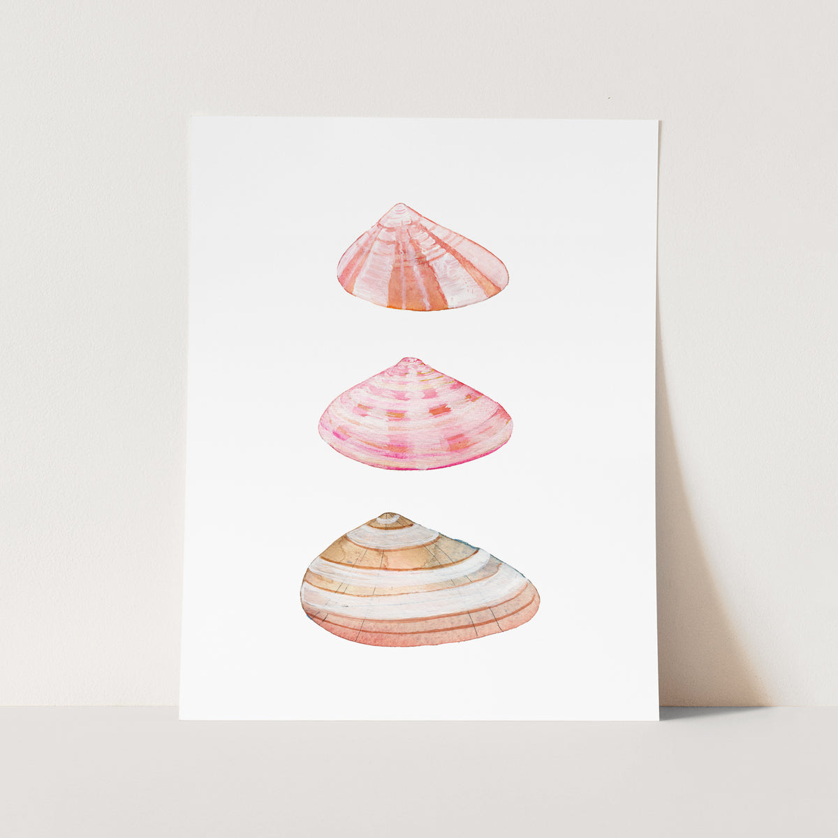 a card with three seashells on it