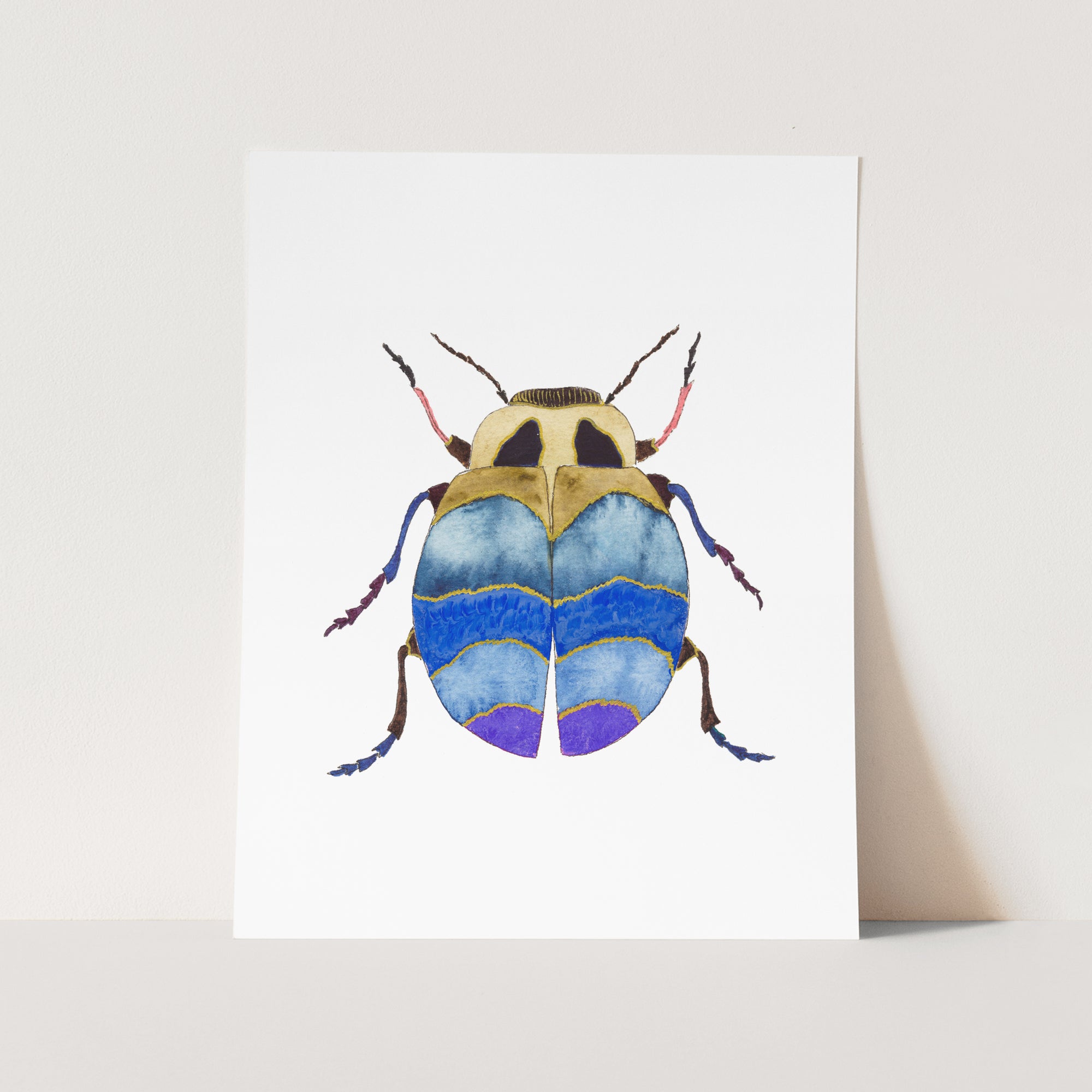 a blue and yellow bug on a white background