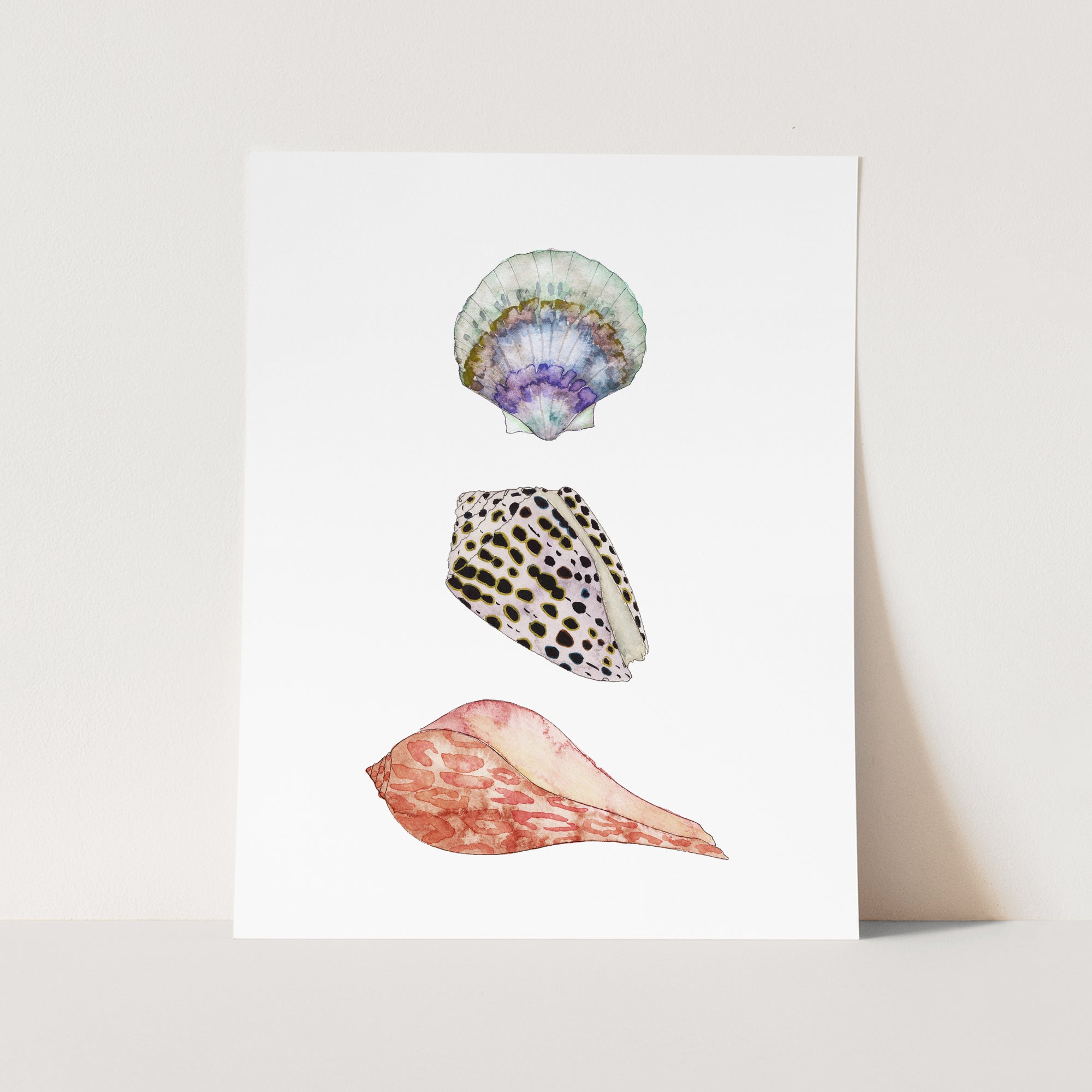a card with three seashells on it
