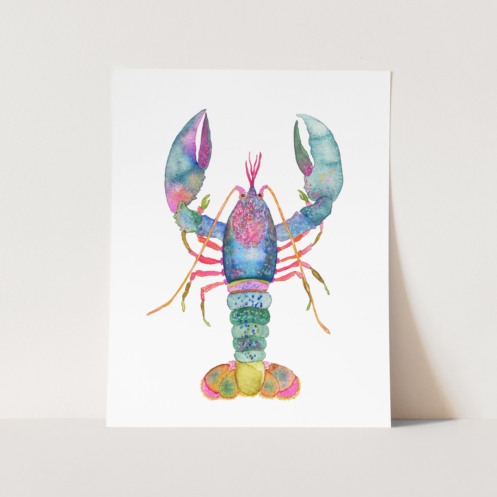 a card with a watercolor painting of a lobster