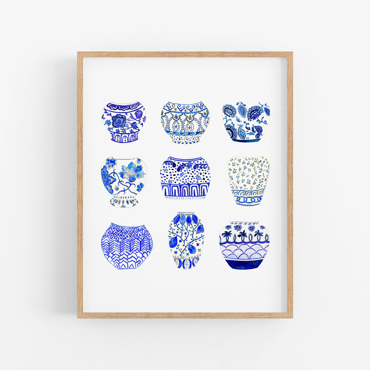 a picture of blue and white vases on a white wall