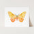 a card with a watercolor painting of a butterfly