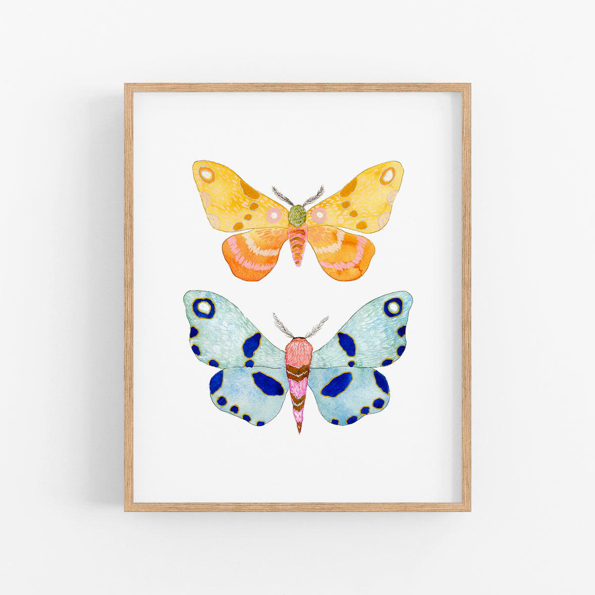 a painting of two butterflies on a white wall