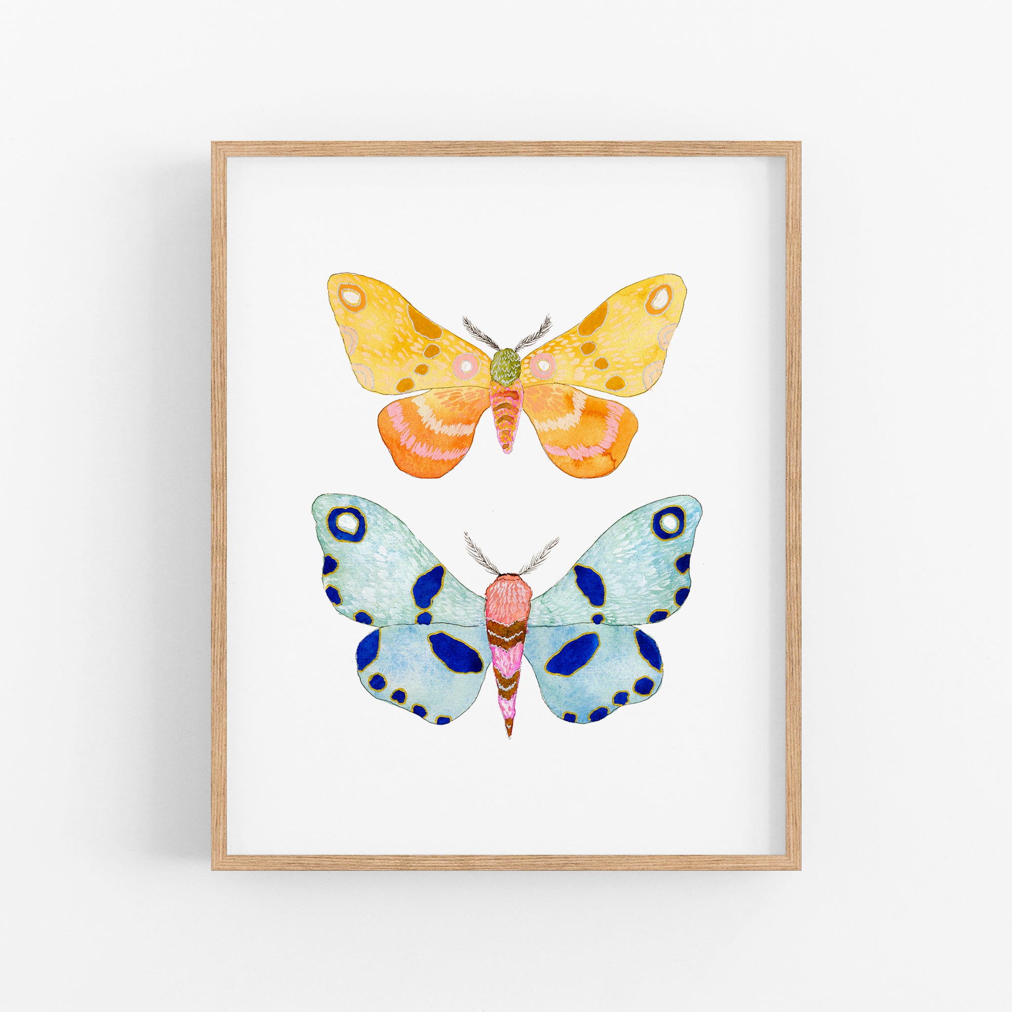 a painting of two butterflies on a white wall