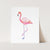 a pink flamingo standing on a white surface