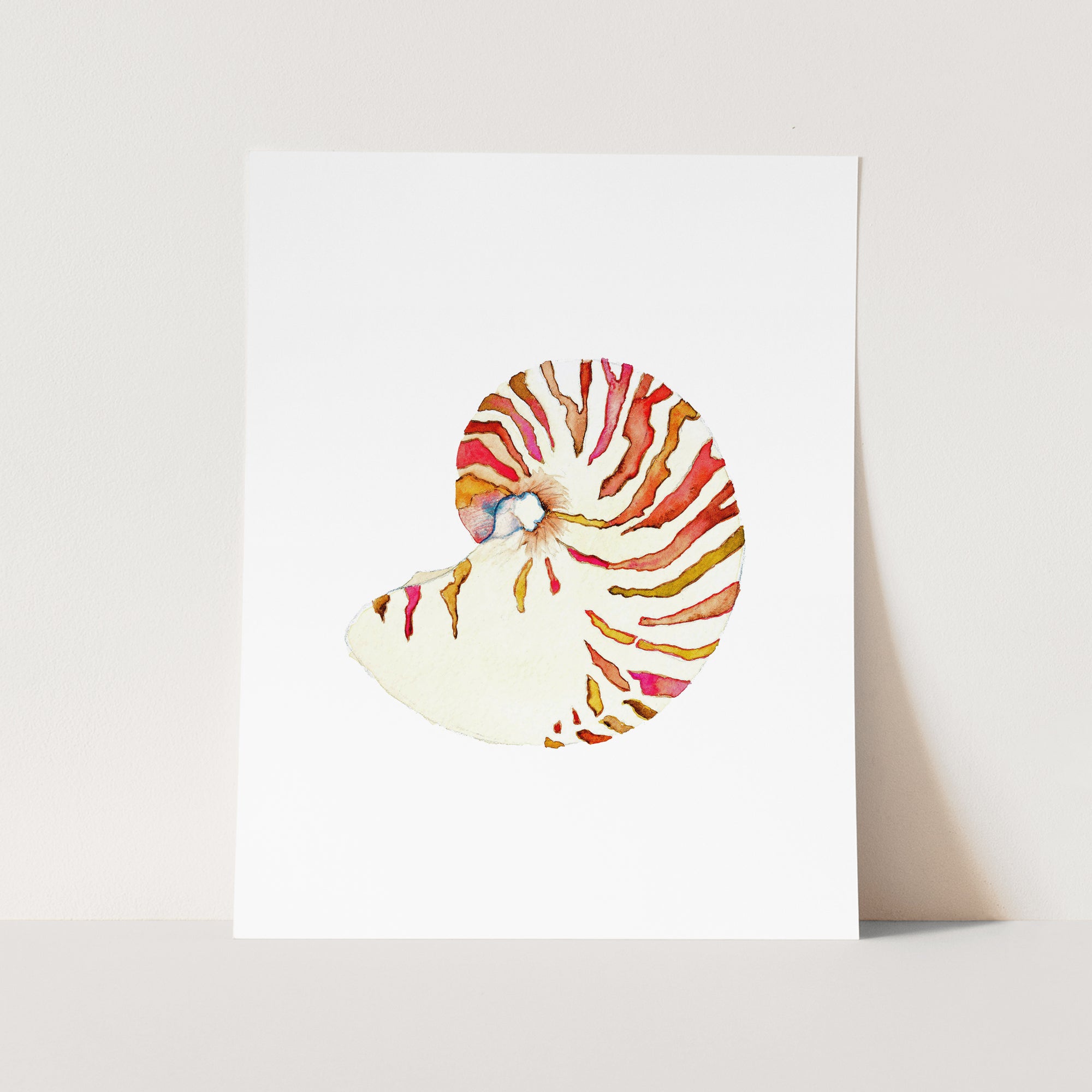 a card with a watercolor painting of a seashell