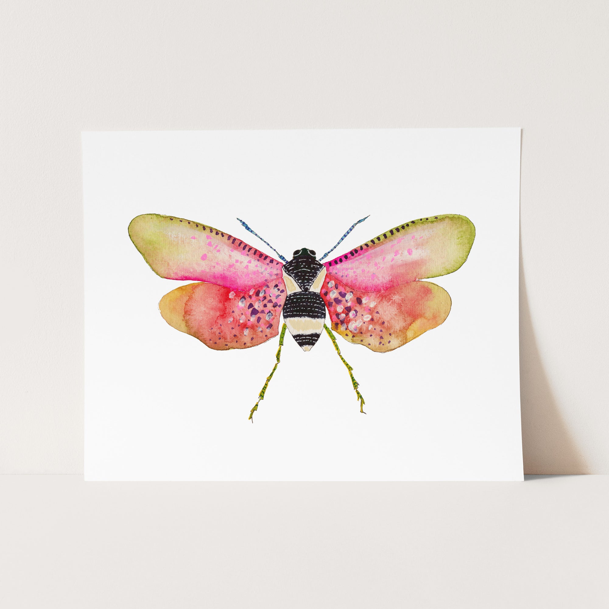 a card with a watercolor painting of a butterfly