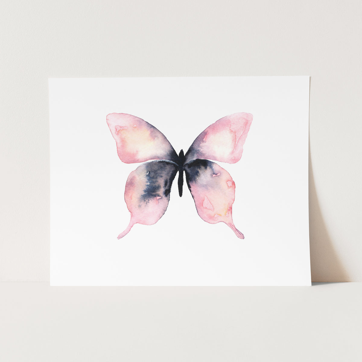 a watercolor painting of a butterfly on a white background