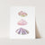 a card with three seashells painted on it