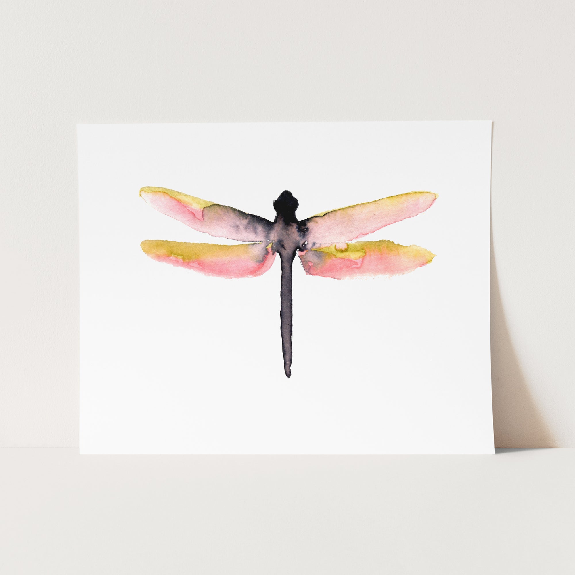 a card with a watercolor painting of a dragonfly