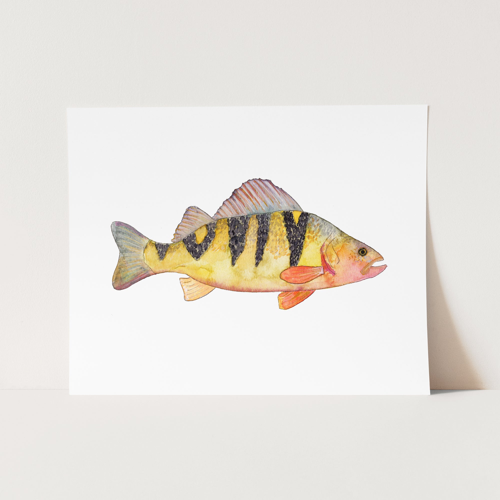 a card with a yellow and black fish on it